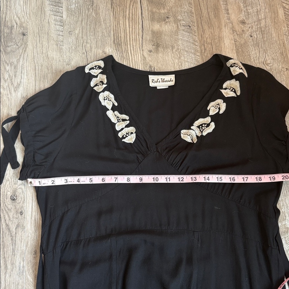 Beautiful Boho Midi Dress with Embroidered Floral Accents - Picture 6 of 12